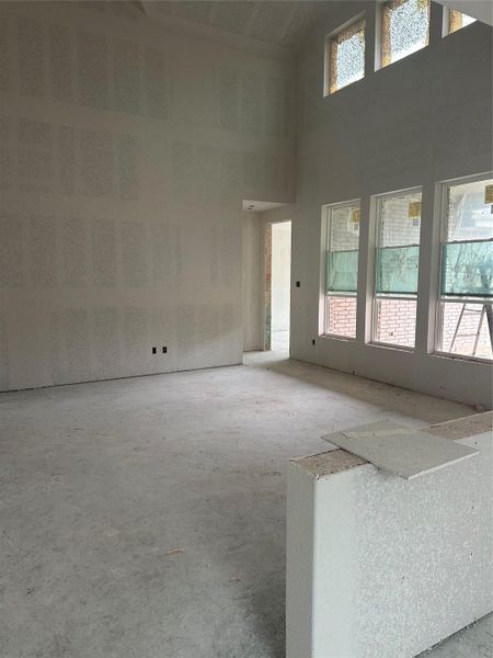 From Kitchen to Family Room with soaring ceiling