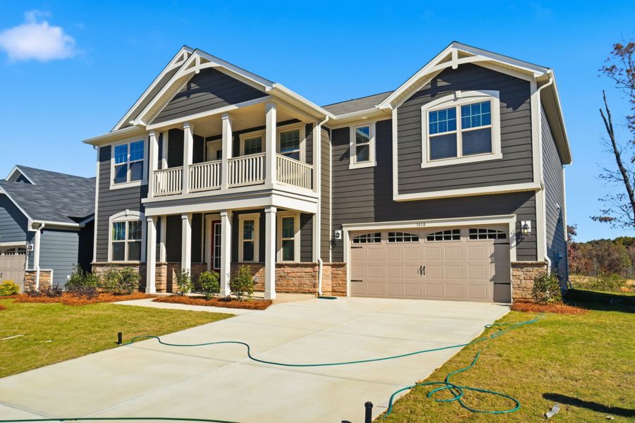 Front exterior of a new home in Waxhaw Landing, Monroe, NC, highlighting curb appeal (Image 2).