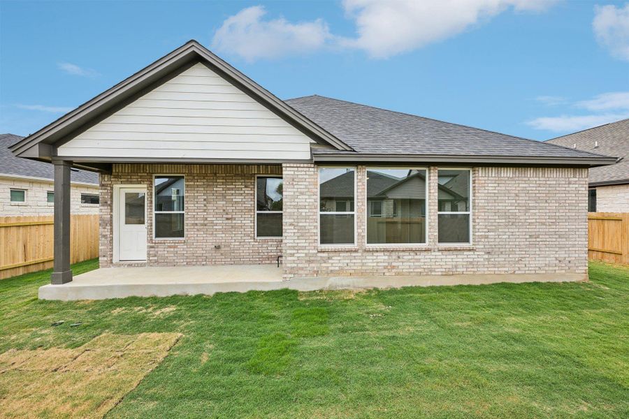 Exterior details and patio area of a home in Persimmon, Buda (Image 4).