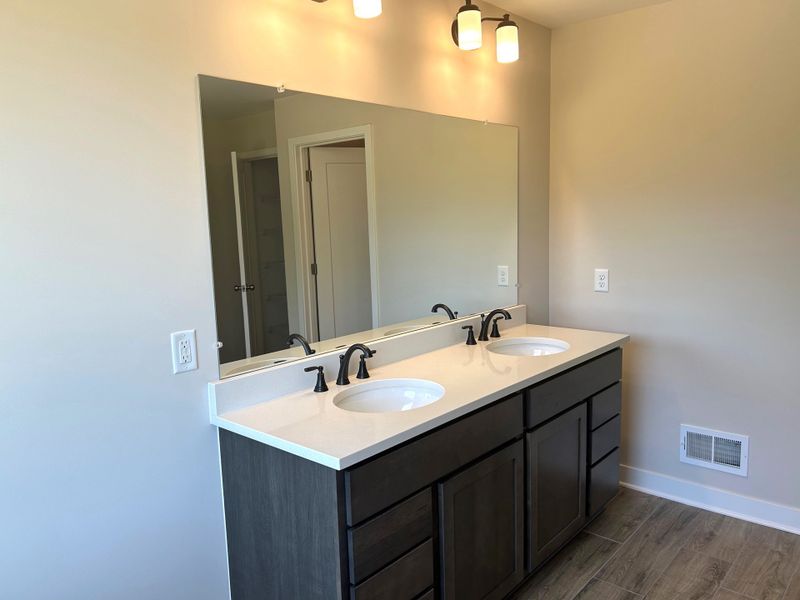 Representative furnished interior of a home built from the The Georgetown II by Norfolk Homes in Coronado Estates, Jackson (Image 19).