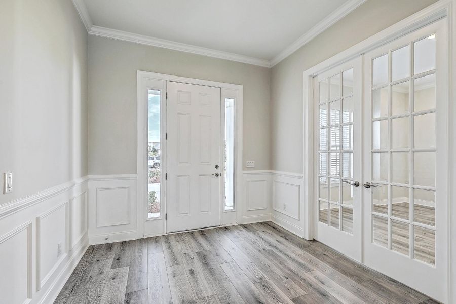 Spacious, unfurnished interior of a new home in K. Hovnanian's® Four Seasons at Lakes of Cane Bay, Summerville (Image 28).