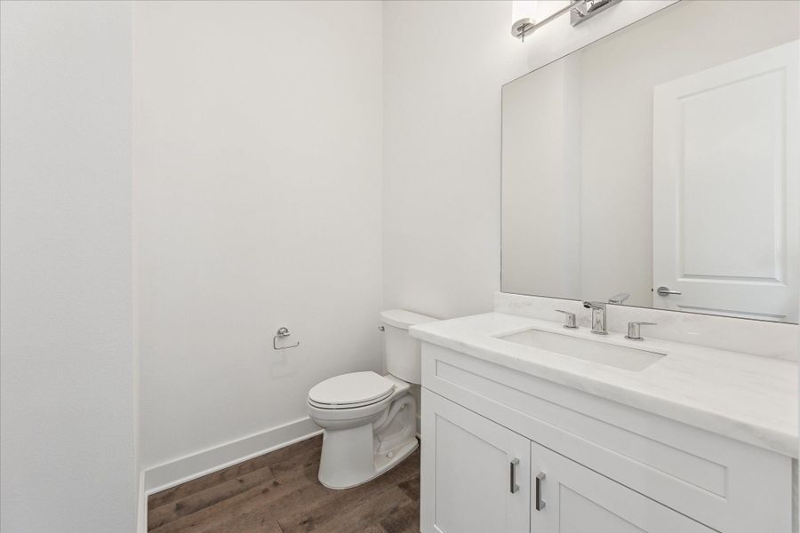 Powder Room on the Second Floor * Marble Counter * Hardwood Floor * Modern Fixtures. Powder Room on the Second Floor * Marble Counter * Hardwood Floor * Modern Fixtures.