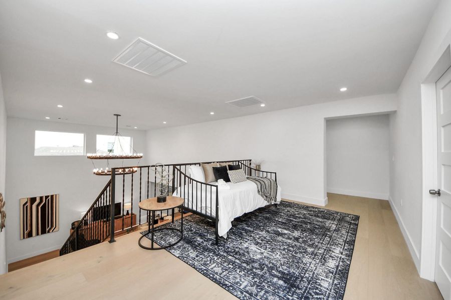 The bright, open loft area offers a versatile space for relaxation or entertainment. The bright, open loft area offers a versatile space for relaxation or entertainment.