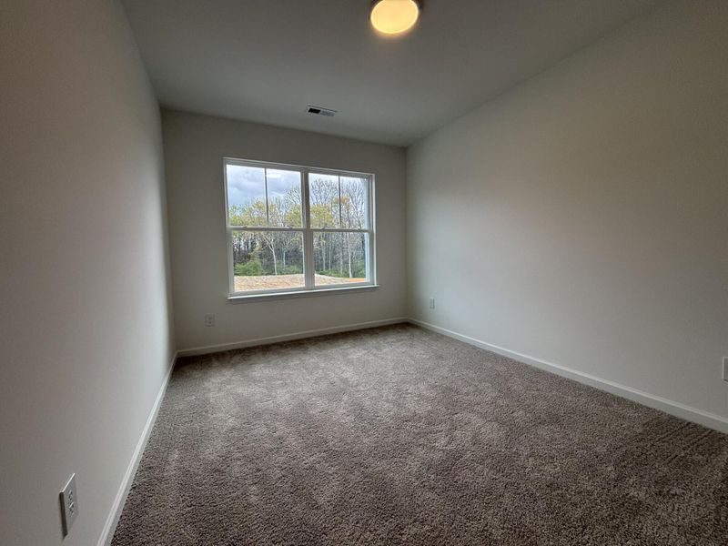 Spacious, unfurnished interior of a new home in CraigStone, Woodruff (Image 10).