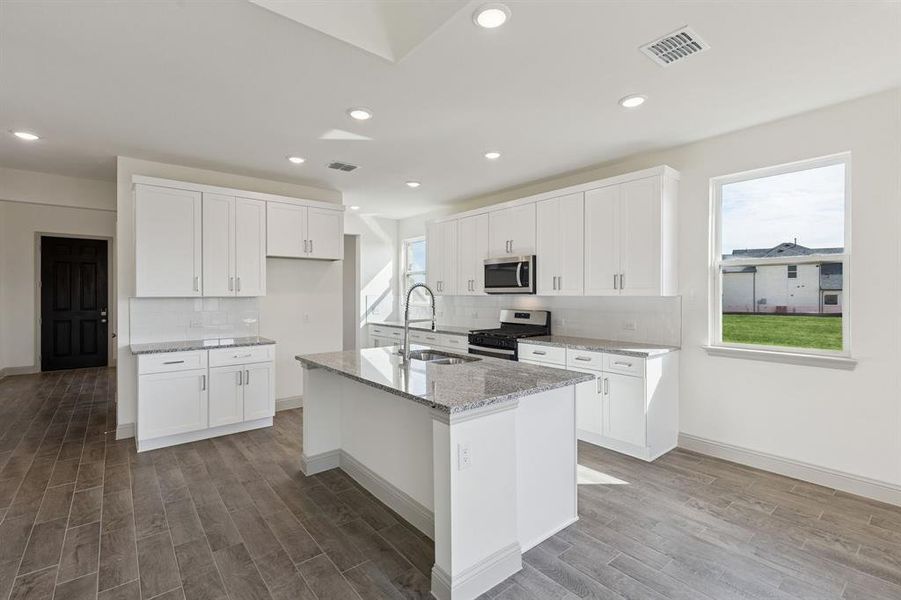 Furnished interior view inside a new home in Venetian, Weston (Image 7).