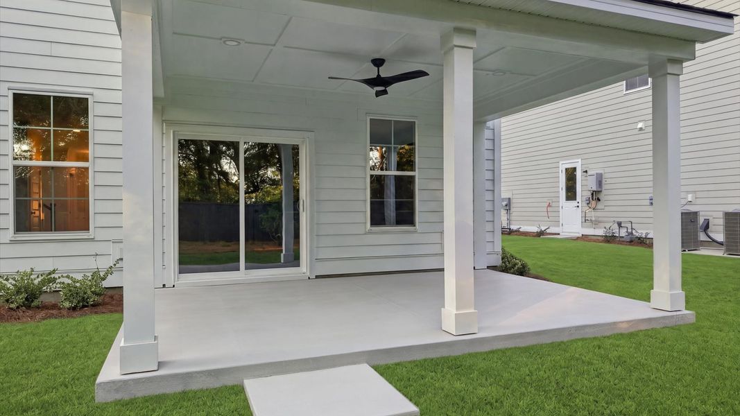 Exterior details and patio area of a home in Oak Bend, James Island (Image 3).