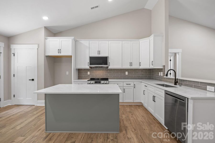Furnished interior view inside a new home in , Statesville (Image 6).