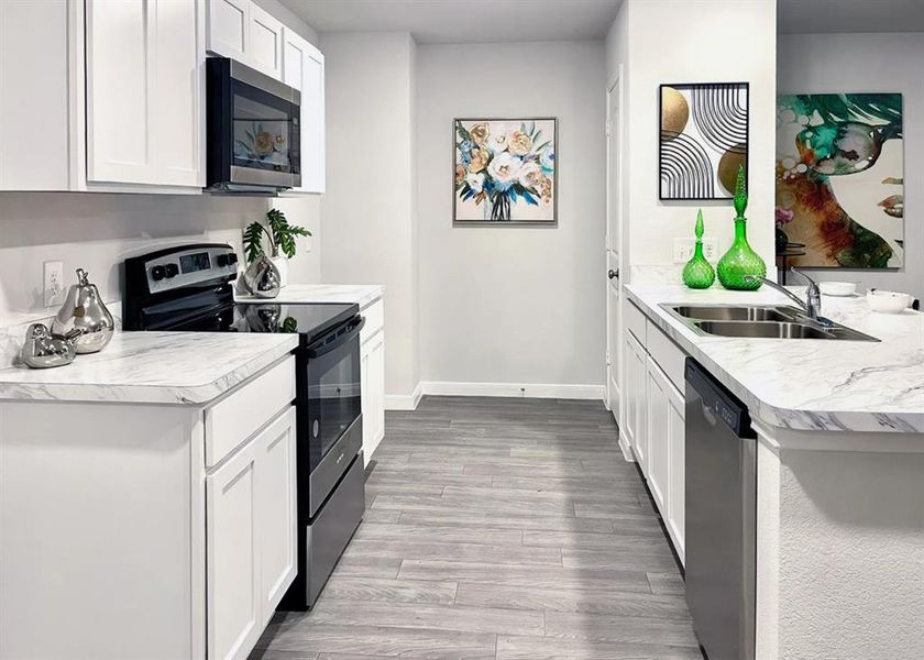 Furnished interior view inside a new home in Whispering Winds, Alvord (Image 9).