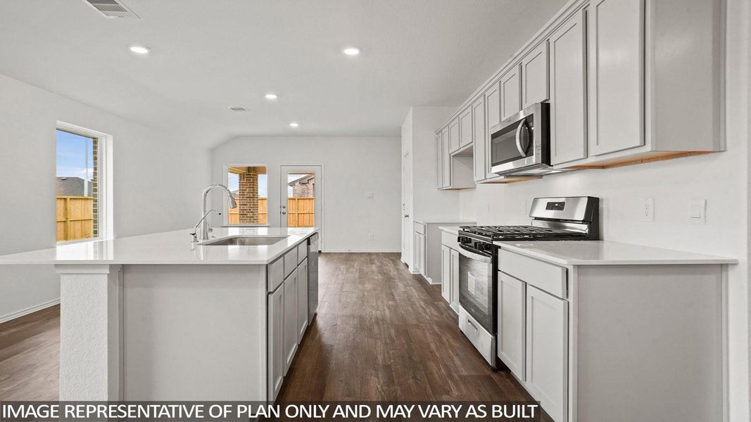 Furnished interior view inside a new home in Sunterra, Katy (Image 7).
