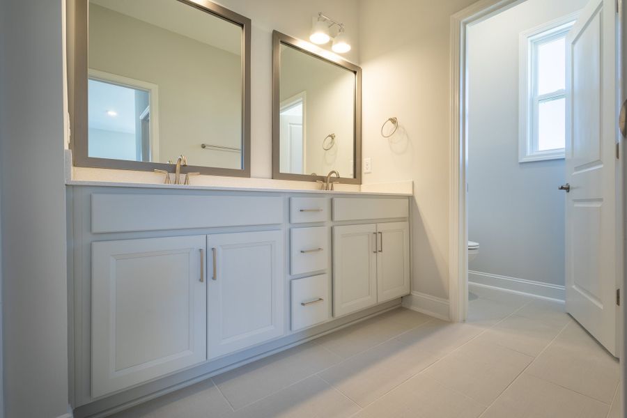 Representative furnished interior of a home built from the Hickory by McKee Homes in The Walk at East Village, Clayton (Image 4). Representative furnished interior of a home built from the Hickory by McKee Homes in The Walk at East Village, Clayton (Image 4).