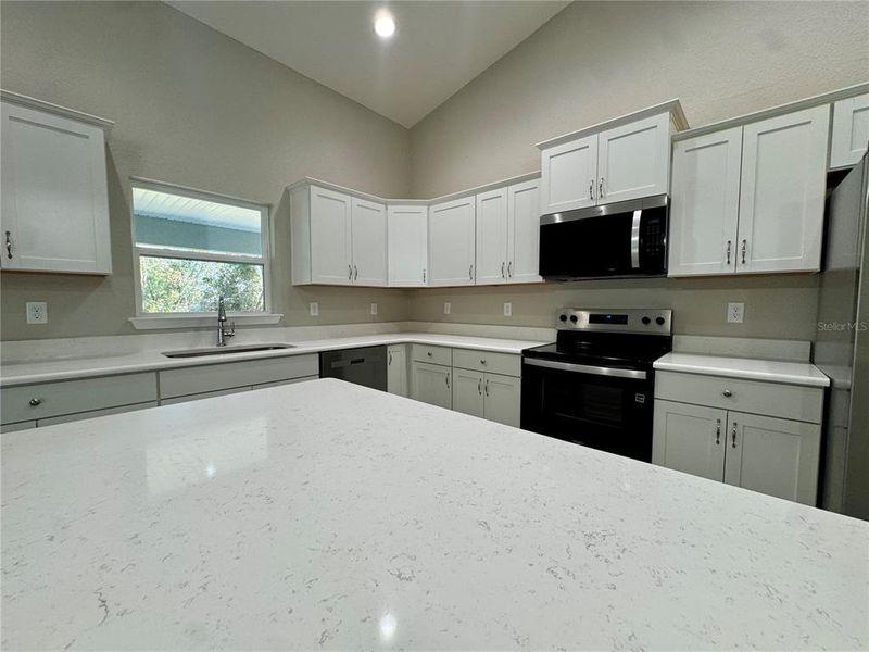 Furnished interior view inside a new home in , Dunnellon (Image 8).