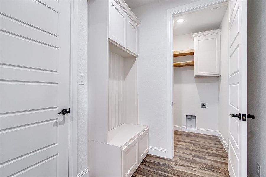 Mudroom featuring dark hardwood / wood-style flooring