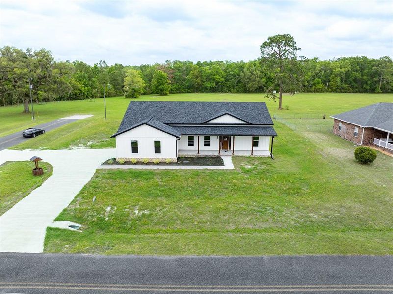 Front exterior of a new home in , Lake City, FL, highlighting curb appeal (Image 26).