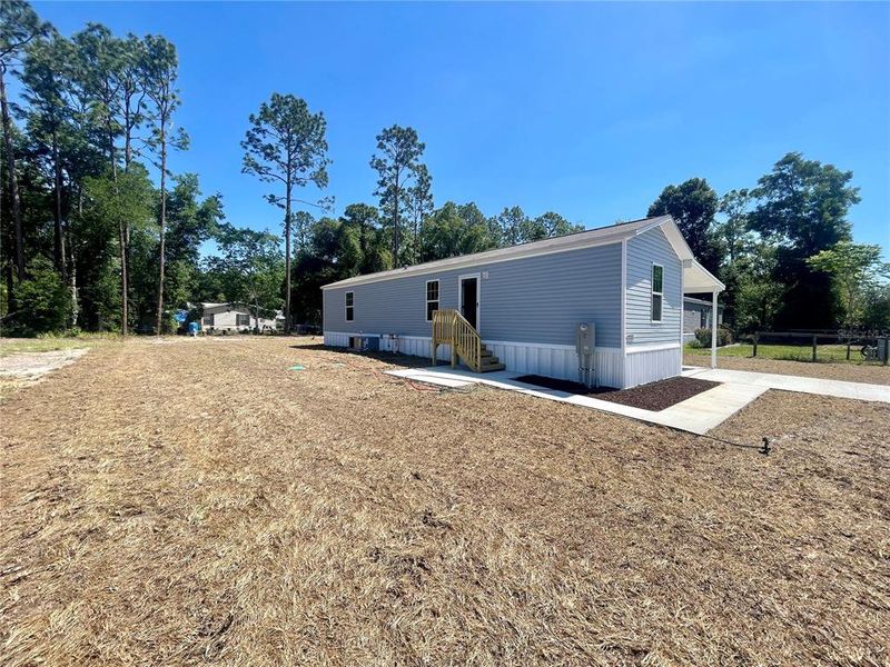 Exterior details and patio area of a home in , Ocala (Image 14).