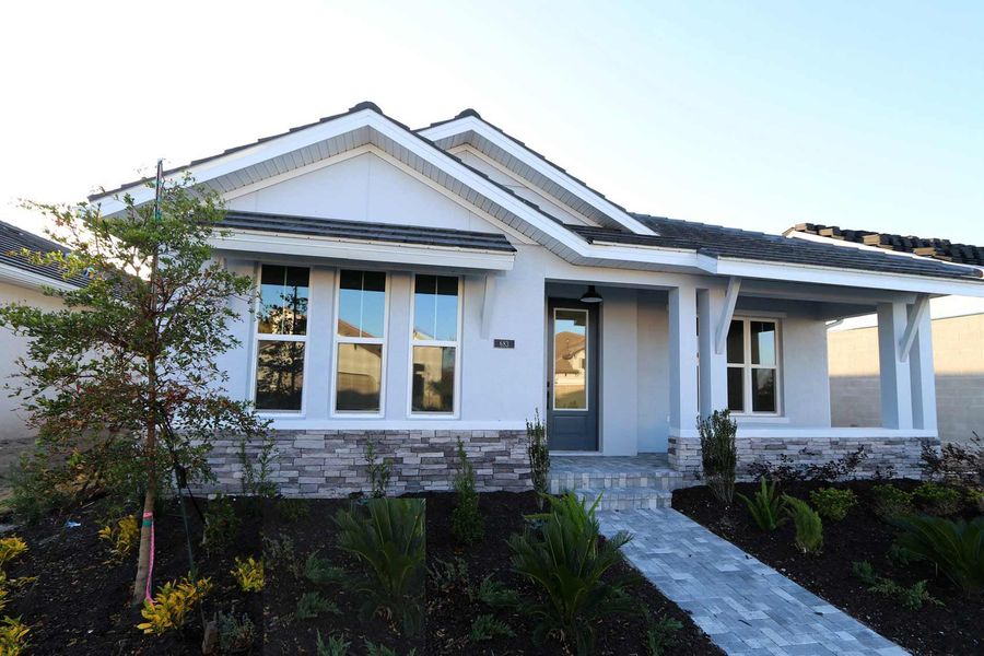 Representative exterior photo of a completed home built from the The Boundary by David Weekley Homes in Vistera of Venice – Cottage Series, Nokomis, FL (Image 3).