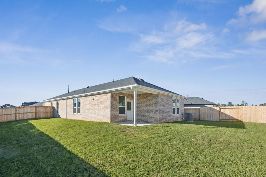 Exterior details and patio area of a home in Montgomery Bend, Montgomery (Image 3).