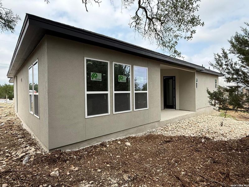 Exterior details and patio area of a home in , Blanco (Image 3).
