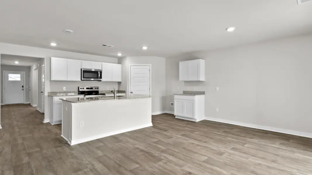 Furnished interior view inside a new home in Vineyard Trail, Jacksonville (Image 8).