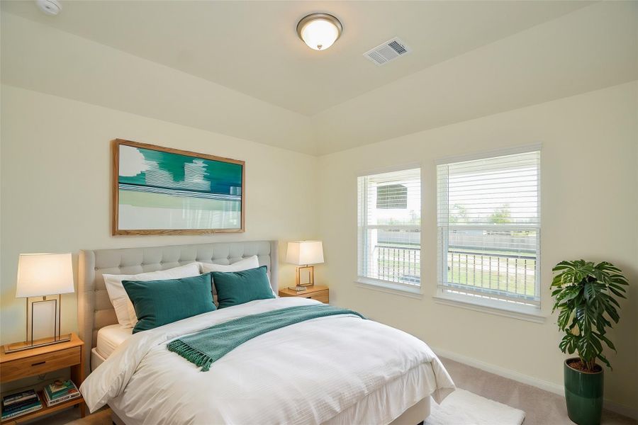 The large windows offer an abundance of natural light.