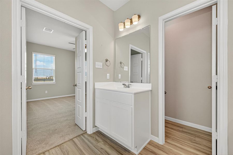 Furnished interior view inside a new home in Sunterra, Katy (Image 13).