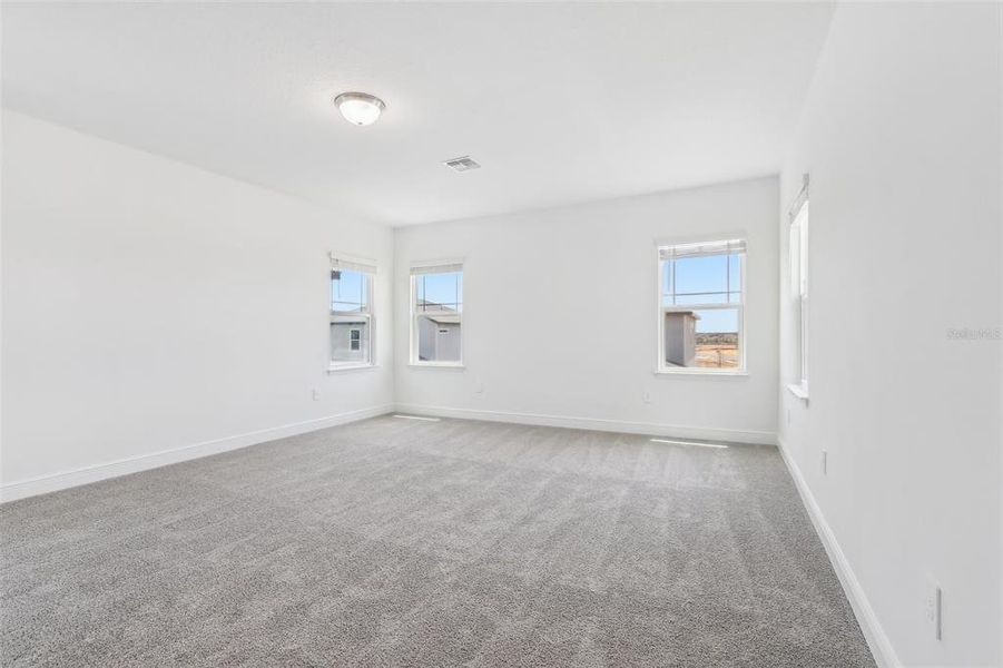 Spacious, unfurnished interior of a new home in Cyrene at Minneola - Villas, Montverde (Image 23).