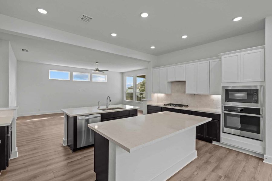 Furnished interior view inside a new home in Buffalo Crossing – New Phase Now Preselling, Cibolo (Image 9).