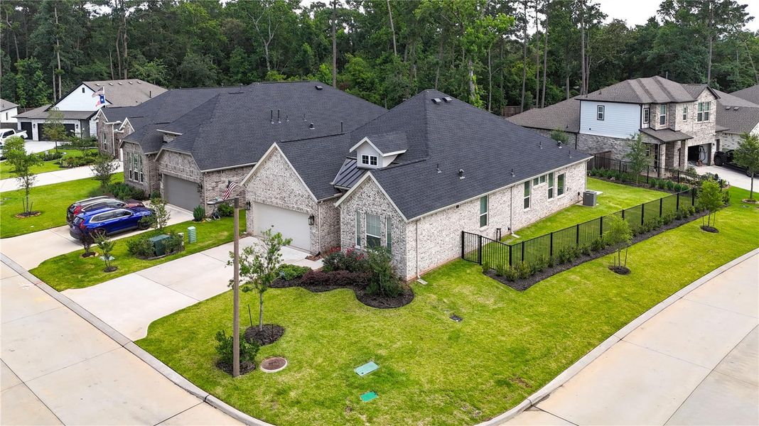Bird's-eye view showcasing the home's spacious lot and attractive curb appeal. Bird's-eye view showcasing the home's spacious lot and attractive curb appeal.
