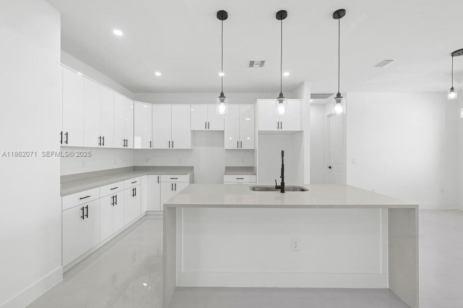 ACTUAL KITCHEN SPACE WITH ISLAND ACTUAL KITCHEN SPACE WITH ISLAND