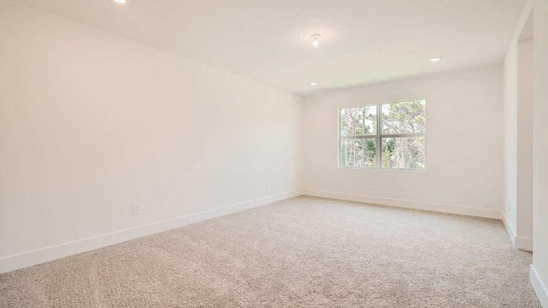 Representative unfurnished interior of a home built from the Ponte Vedra by D.R. Horton in Preserves at Park Trace, Stuart (Image 15).