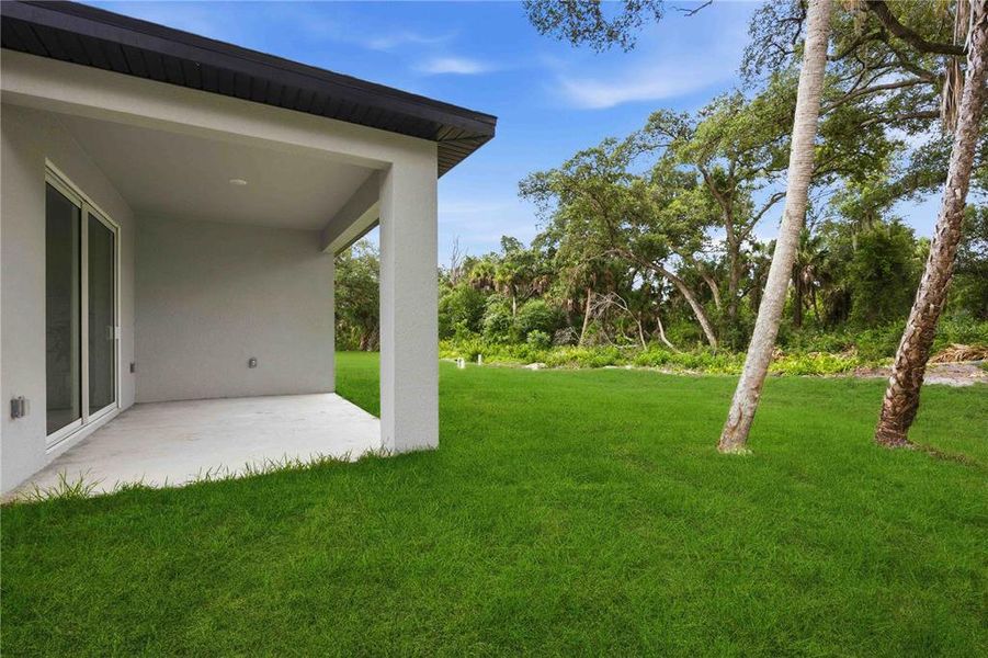 Exterior details and patio area of a home in , Port Charlotte (Image 32).