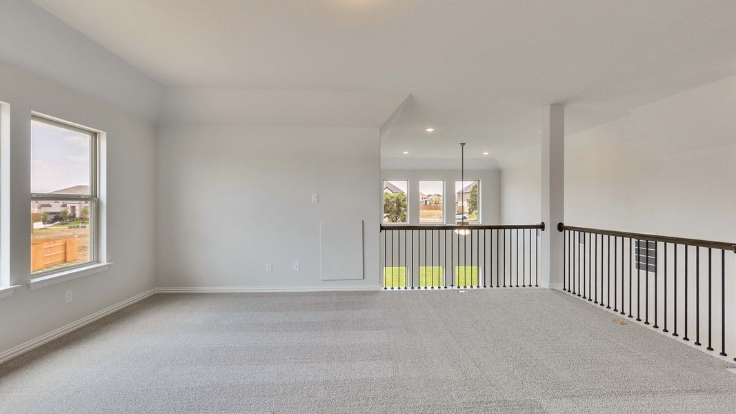 Furnished interior view inside a new home in Oaks at San Gabriel, Georgetown (Image 15).