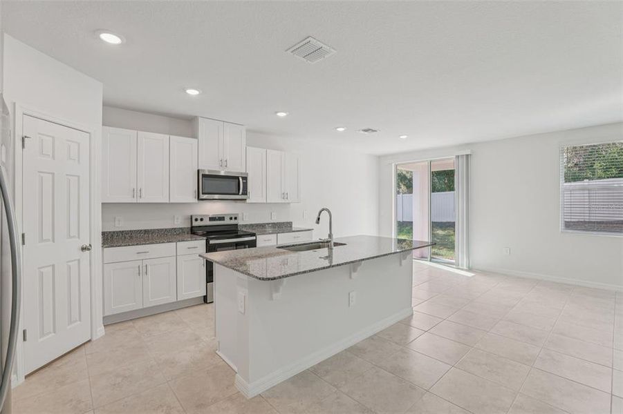 Furnished interior view inside a new home in Deer Run at Crosswinds, Davenport (Image 6).