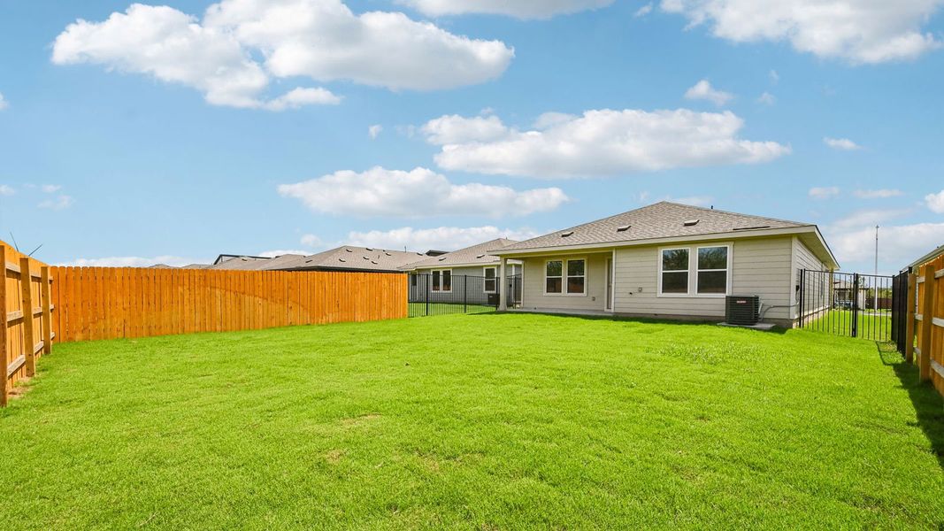 Exterior details and patio area of a home in Trails at Wildhorse, Austin (Image 4).