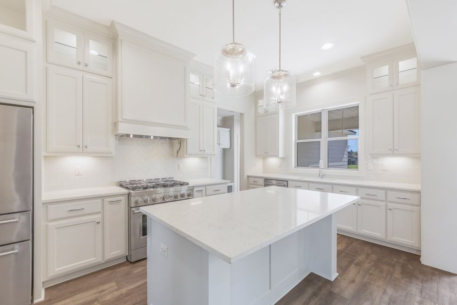Representative furnished interior of a home built from the The Charlotte by Manuel Builders in Chapel Bend, Montgomery (Image 7).