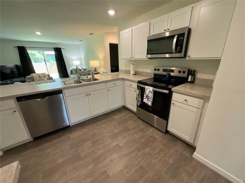Furnished interior view inside a new home in , Port Charlotte (Image 41).
