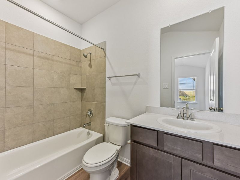 Furnished interior view inside a new home in Riverbend at Double Eagle - Reserve Collection, Cedar Creek (Image 4).