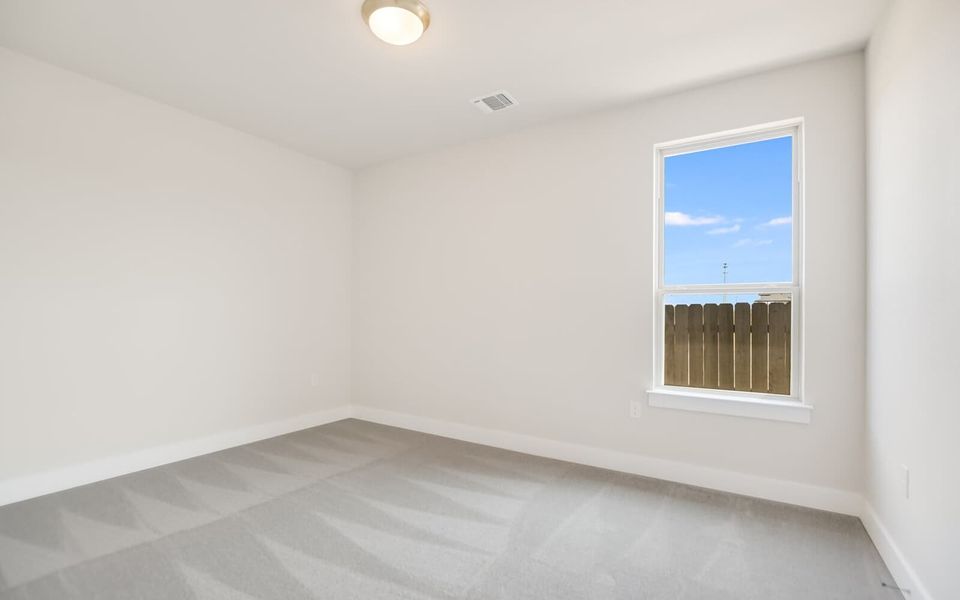 Representative unfurnished interior of a home built from the Drake by Brookfield Residential in Traditional Homes at Easton Park, Austin (Image 11).
