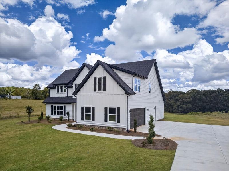 Front exterior of a new home in Blackwelder Bluff, Bowdon, GA, highlighting curb appeal (Image 29).
