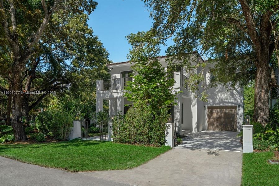 Front exterior of a new home in , Miami, FL, highlighting curb appeal (Image 1). Front exterior of a new home in , Miami, FL, highlighting curb appeal (Image 1).
