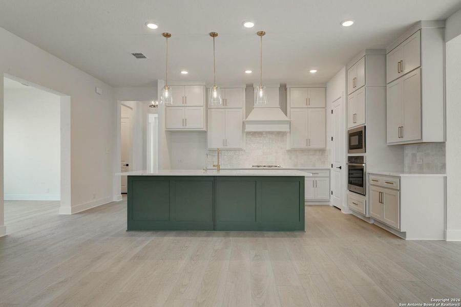 Furnished interior view inside a new home in Megan's Landing, Castroville (Image 5).