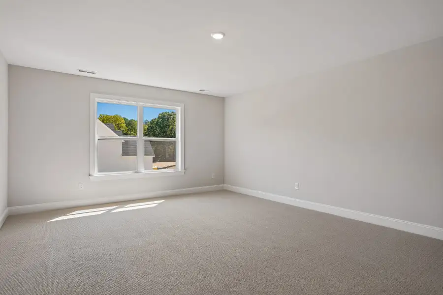 Representative unfurnished interior of a home built from the Fontana by Caruso Homes in Blue Run, Raleigh (Image 32).