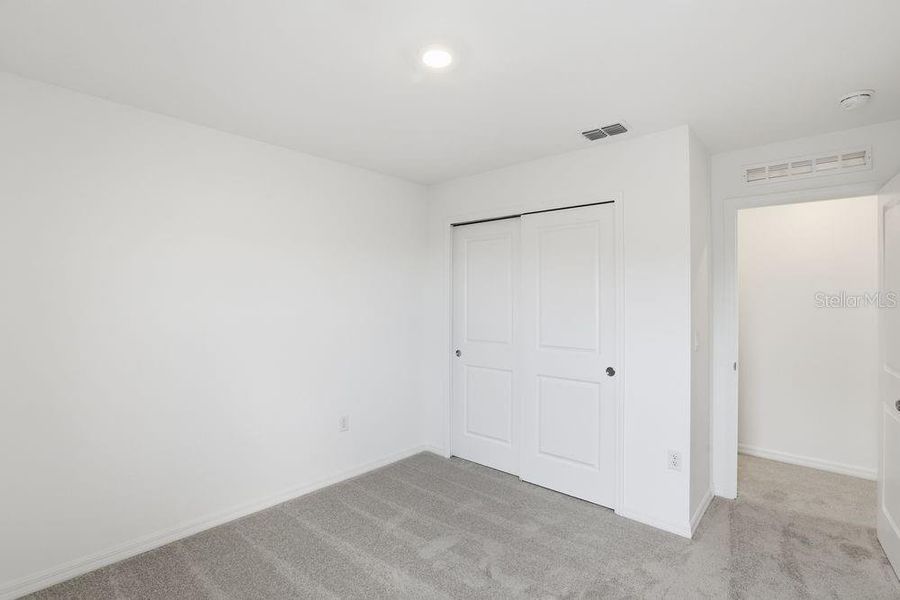 Spacious, unfurnished interior of a new home in Waterstone, Groveland (Image 40).