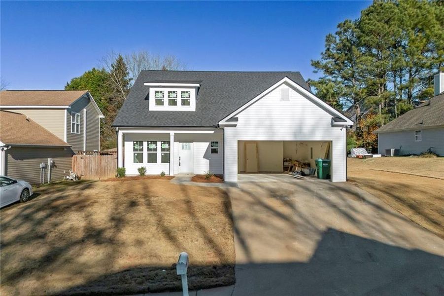 Front exterior of a new home in , Canton, GA, highlighting curb appeal (Image 2). Front exterior of a new home in , Canton, GA, highlighting curb appeal (Image 2).