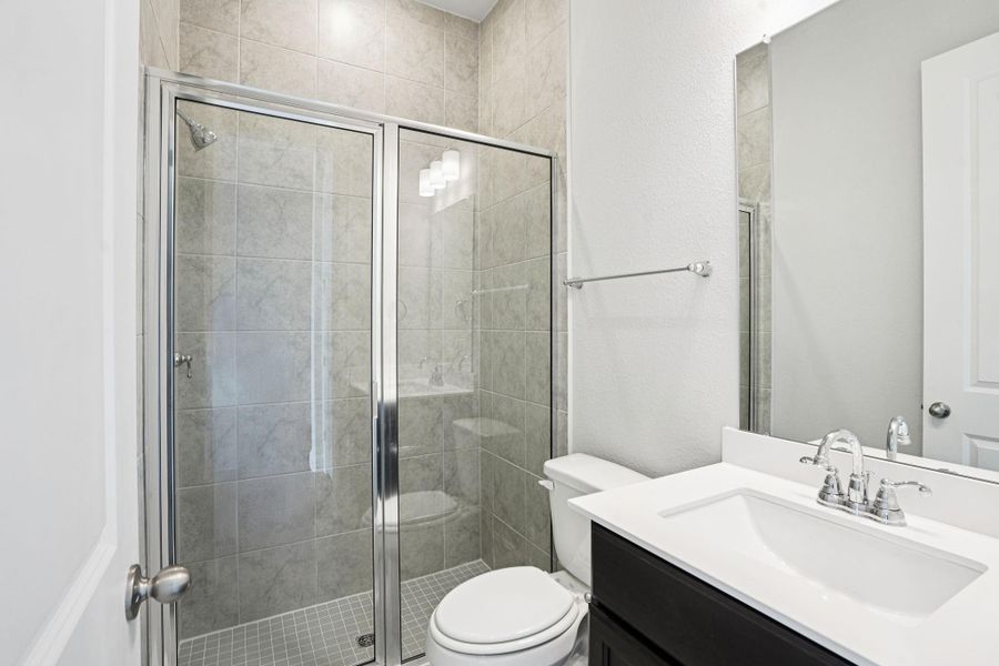 Furnished interior view inside a new home in Del Bello Lakes 60', Manvel (Image 19).