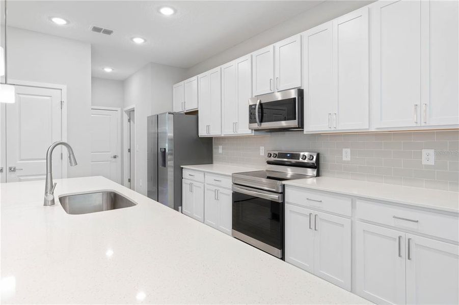 Furnished interior view inside a new home in , Cape Coral (Image 17).