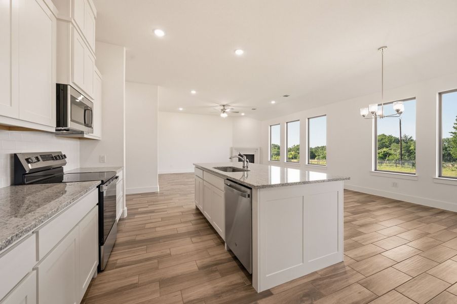 Furnished interior view inside a new home in Saddleback Estates, Boyd (Image 11).