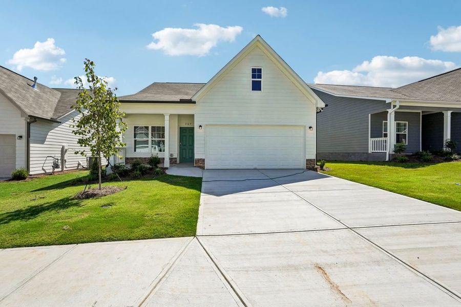 Front exterior of a new home in Villages at Cedar Hill, Dallas, GA, highlighting curb appeal (Image 2).