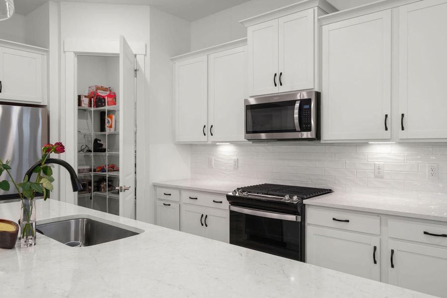 Furnished interior view inside a new home in Summerwind Crossing at Lakes of Cane Bay, Summerville (Image 28).