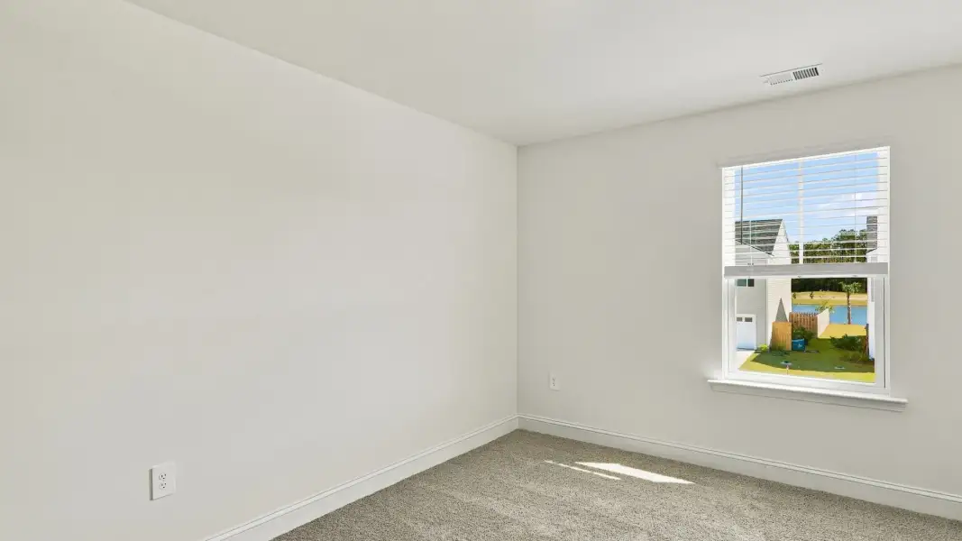 Spacious, unfurnished interior of a new home in The Lakes at North Glynn, Brunswick (Image 18).