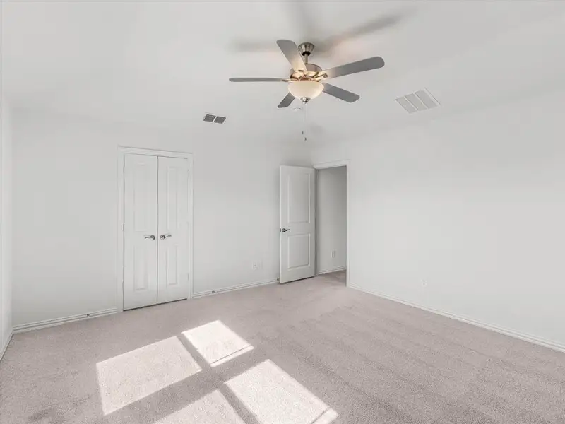 Spacious, unfurnished interior of a new home in Simpson Crossing - Spring Series, McKinney (Image 17).